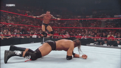 Two Wrestlers In Ring With WWEHD Text GIF