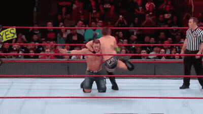 Two Wrestlers In Ring With Yes Sign GIF
