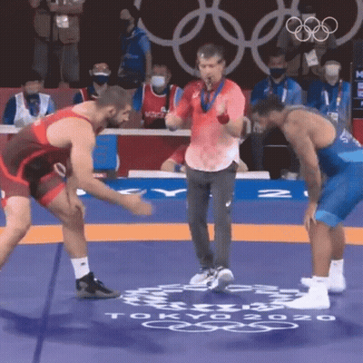Two Wrestlers On Mat With Tokyo 2020 GIF