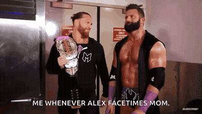 Two Wrestlers One Holding Championship Belt GIF