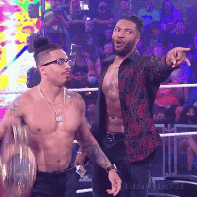 Two Wrestlers One In Carmelo Hayes T-Shirt GIF