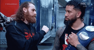 Two Wrestlers, One Wearing Wrestling Belt GIF