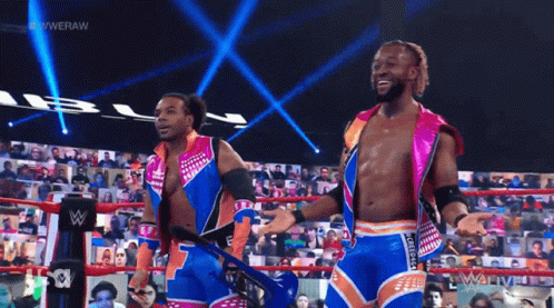 Two Wrestlers Standing In Ring GIF