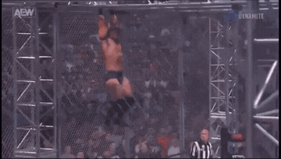 Two Wrestlers Wrestling In Ring With AEW Logo GIF