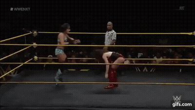 Two Wrestlers Wrestling In Ring With Referee GIF