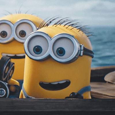 Two Yellow Minions Wearing Goggles Sitting On Dock GIF