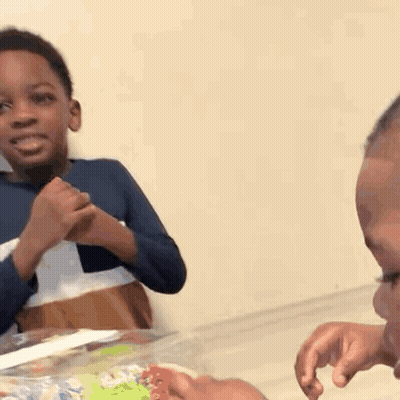 Two Young Boys Crying And Laughing GIF
