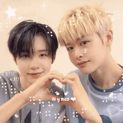 Two Young Men Are Making A Heart Shape With Their Hands And The Name Ili Y Nico Is On The Bottom Left GIF