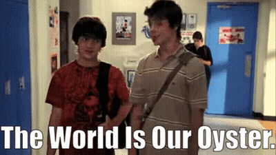 Two Young Men Are Standing Next To Each Other In A Hallway With The Words `` The World Is Our Oyster '' Written Above Th GIF