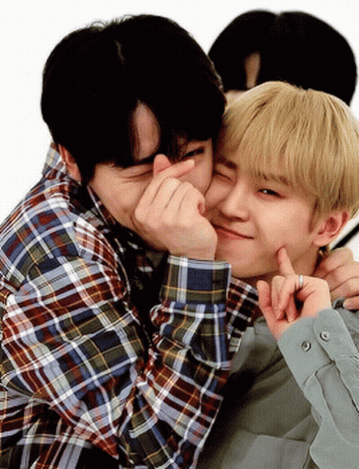 Two Young Men Hugging One Making Heart GIF