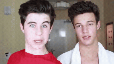 Two Young Men Making Funny Faces GIF