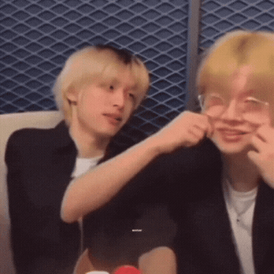 Two Young Men Making Funny Faces On Couch GIF