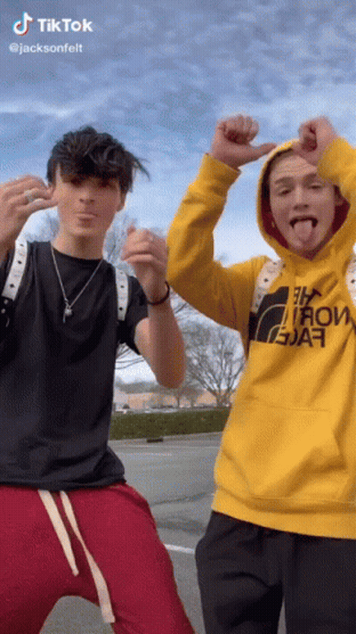 Two Young Men One In Yellow North Face Hoodie GIF