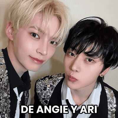 Two Young Men Posing De Angie Y Ari GIF