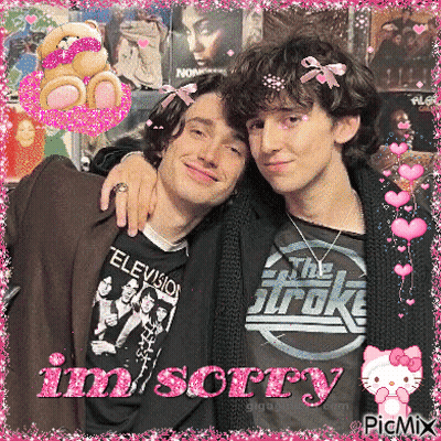 Two Young Men Posing For A Picture With The Words Im Sorry Written In Pink GIF