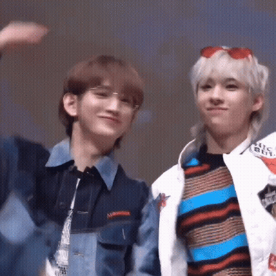 Two Young Men Smiling At Camera GIF
