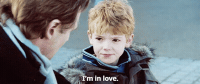 Two Young Men Standing On A Road GIF