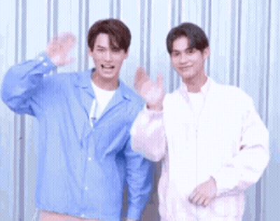 Two Young Men Waving Hands GIF