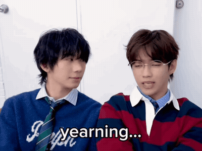 Two Young Men With Yearning GIF