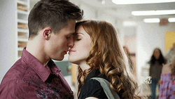 Twosome Sharing Passionate Kiss At The Corridor GIF