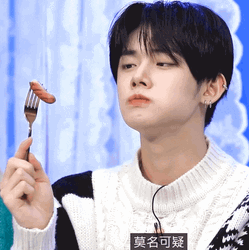 TXT Yeonjun Eating Hotdog GIF