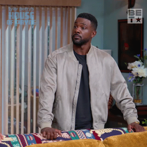 Tyler Perry's House Of Private Shows Man Standing In Front Of Couch GIF