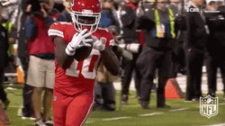Tyreek Hill Calling Football GIF