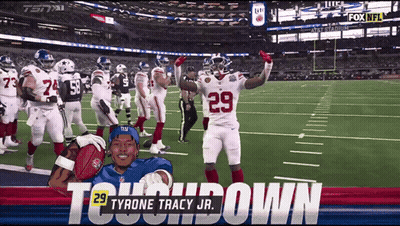 Tyrone Tracy Jr. Holding Football GIF