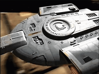 U.S.S. Defiant Flying In Space GIF