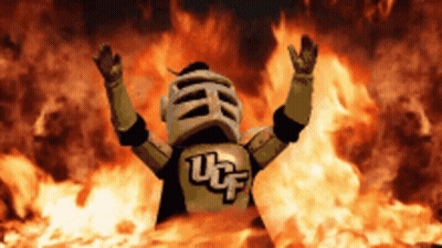 UCF Knight Mascot In Front Of Fire GIF
