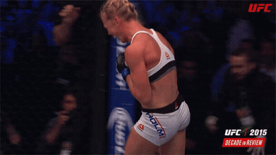 UFC 2015 Decade Review Poster Woman In Reebok Top GIF