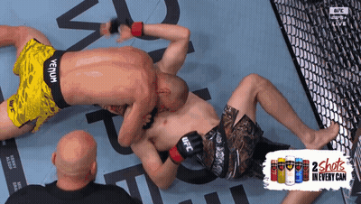 UFC Fighter Laying On Ground With 2 Shots Can GIF