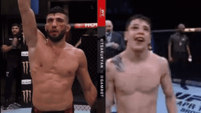 UFC Fighters In Ring With Monster Energy Ad GIF
