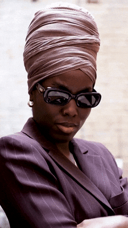 Unbothered Girl Holds Shades What GIF