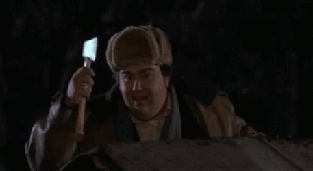 Uncle Buck Shows Ax GIF