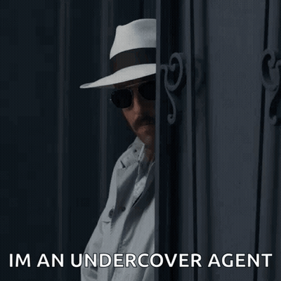 Undercover Agent Peeking Out GIF