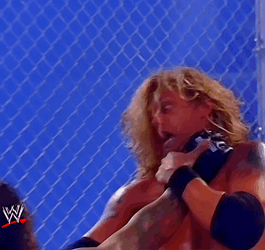 Undertaker Chokeslam Edge On Table GIF