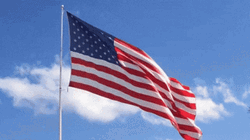 United State Flag In Blue Sky GIF