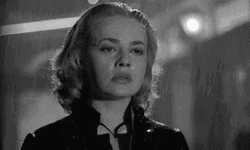 Upset Jeanne Moreau Walking In The Rain GIF