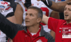 Urban Meyer Pointing While Looking On The Score GIF