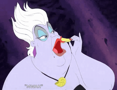 Ursula From The Little Mermaid Eating A Piece Of Food GIF