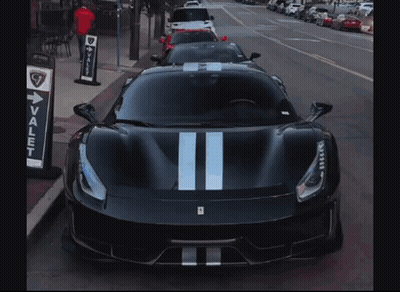 Valet Sign Next To Black Sports Car GIF