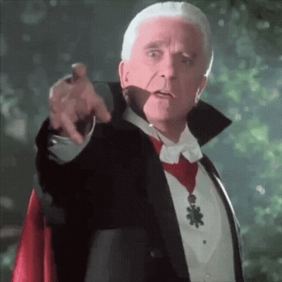 Vampire Man Pointing GIF