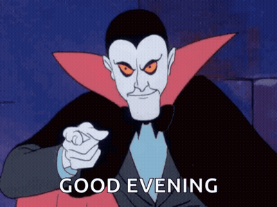 Vampire Pointing With Good Evening GIF