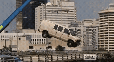 Van Lifted Over Bridge By Crane With AMC.com GIF