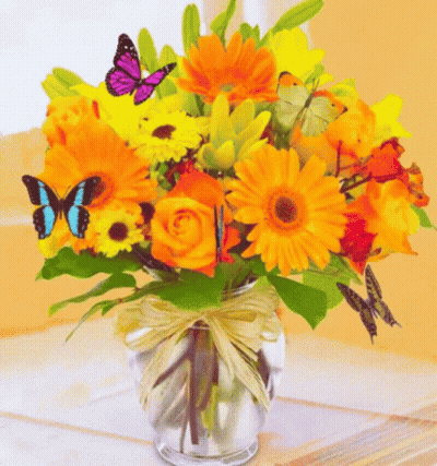 Vase With Yellow and Orange Flowers and Butterflies