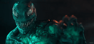 Venom Character Close Up Dark Room Green Background GIF