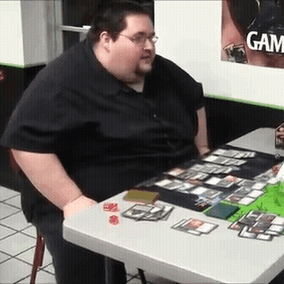Very Fat Man At Table With Cards And Dice GIF