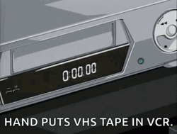 Vhs Tape Putting In VCR Player GIF