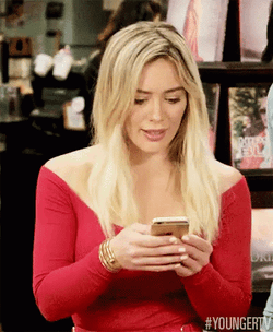 Vibrant Hillary Duff Texting GIF